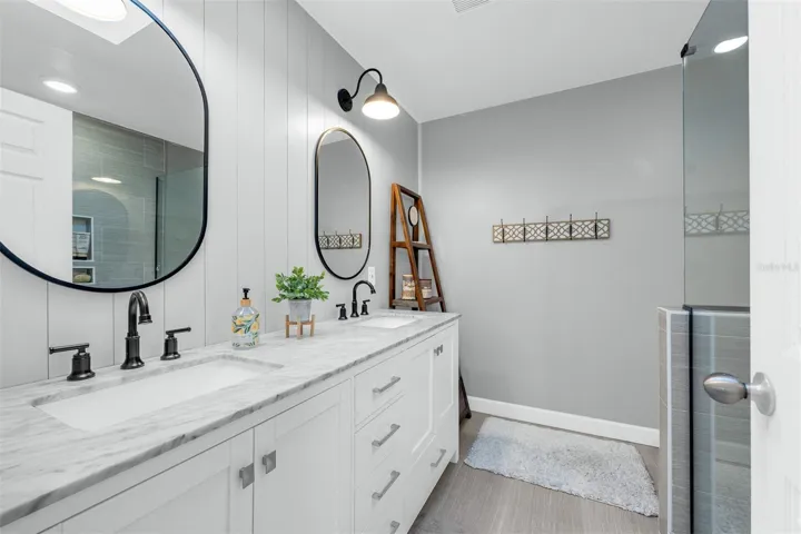 Master bathroom with walk-in shower. Dual sinks.  7'10