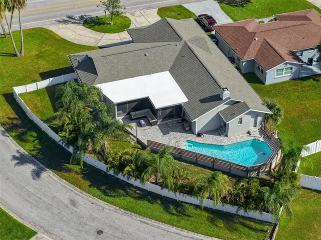 Corner lot. Mature Landscaping. Open Pool deck.