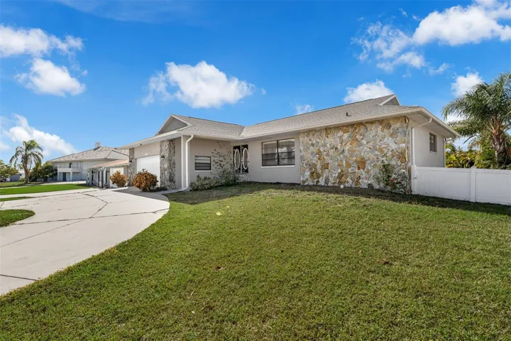 .24 Acres Single story 4-BR, 3 1/2-BA. Huge lanai. Open pool.