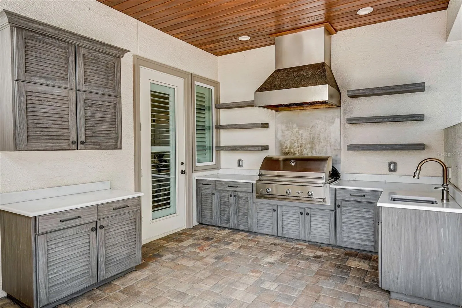 Outdoor grill area off kitchen