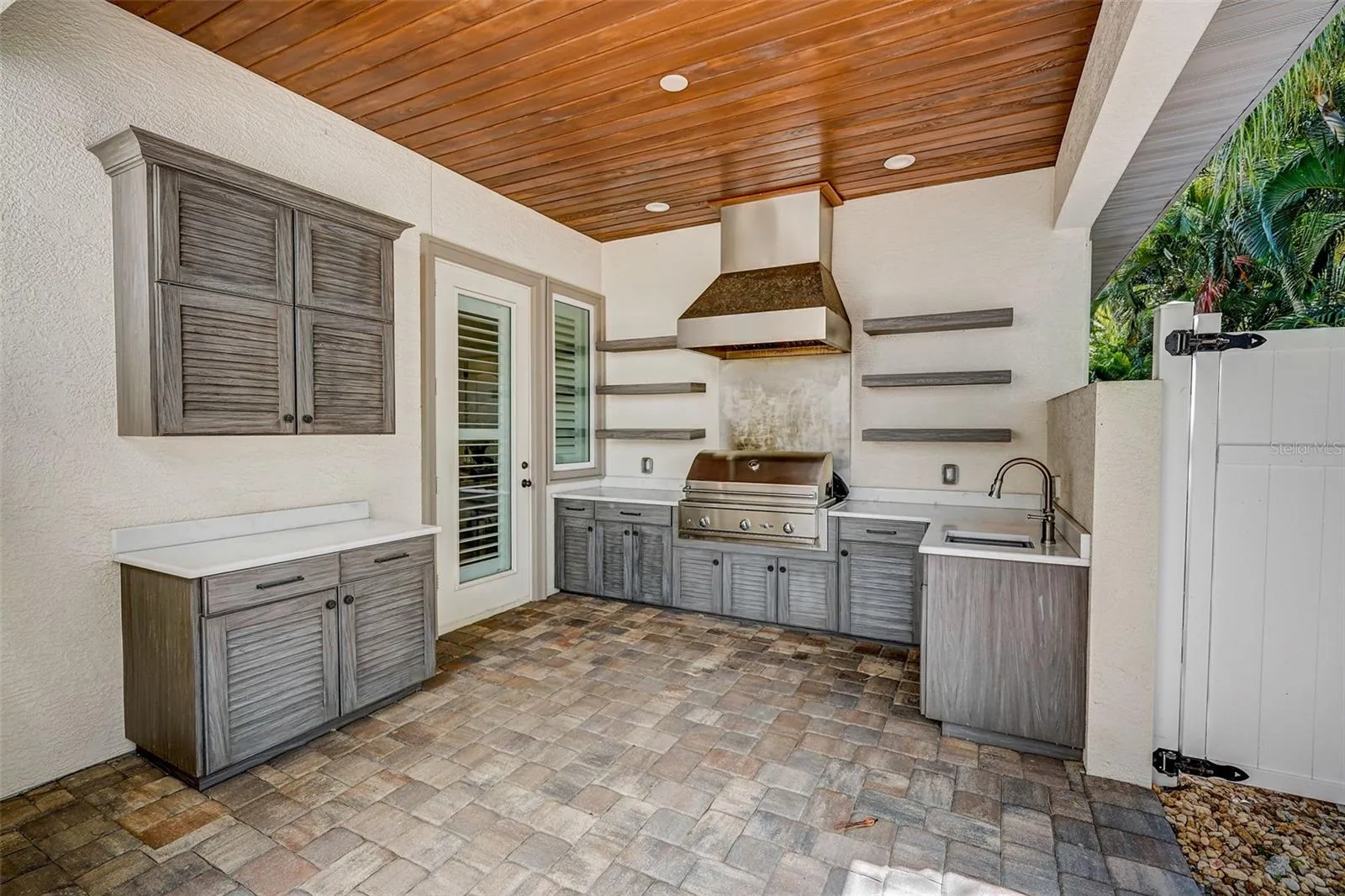 Outdoor grill area off kitchen