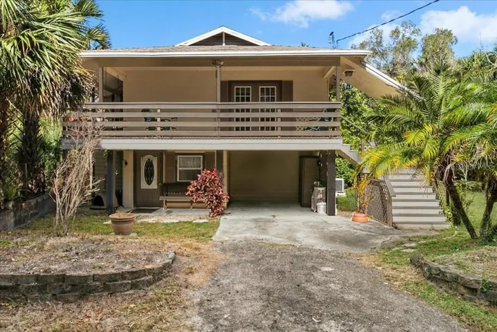 front of home, one car carport