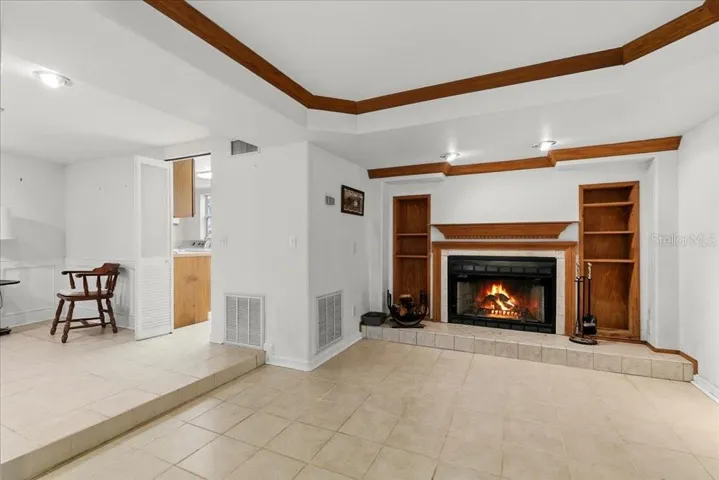 utility room to the left of the downstairs fireplace