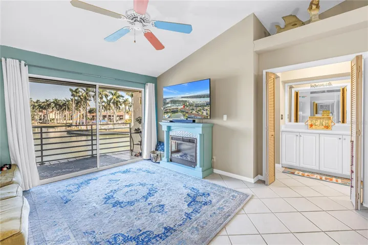 Living Room with sliding doors to balcony and golf course views