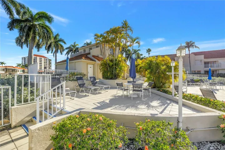 Plenty of pool seating and umbrellas
