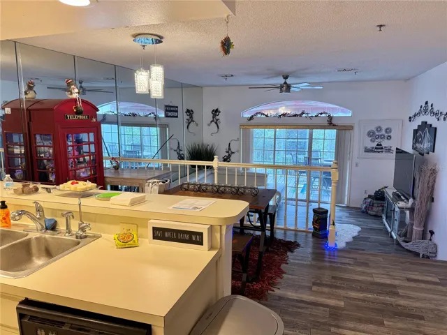 Kitchen to Dining to the Great Rm to the rear