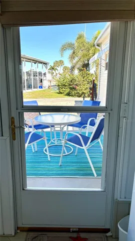 Backdoor to backyard patio