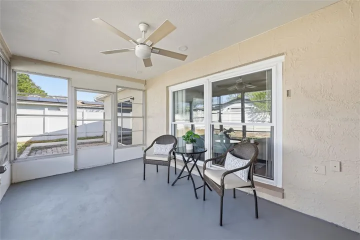 SCREENED-IN BACK PORCH