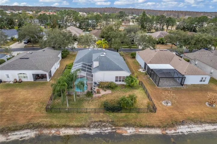 Aerial View of rear of home and backyard
