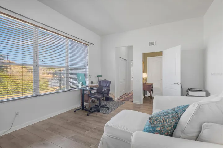 bedroom #4 has direct views of Lake Fern and a full bathroom off the hallway.