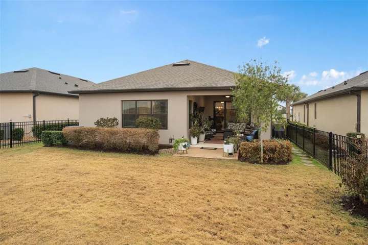 Rear View and a Fenced Backyard
