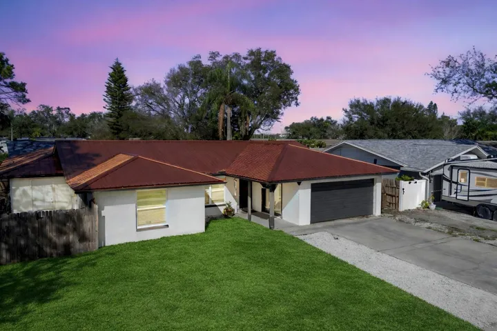Welcome home to this spacious Seminole home on a corner lot!