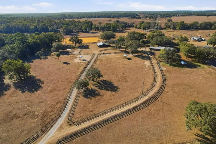 18.95 Acres, Home, barns, arena, $699K