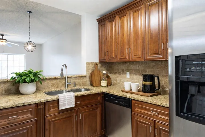 Remodeled Kitchen: Granite And Solid Wood Cabinetry