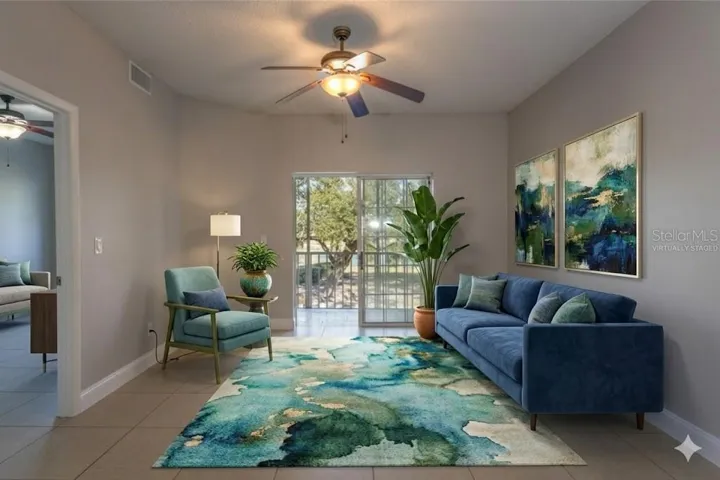 VIRTUALLY STAGED Living Area With Fan And Slider