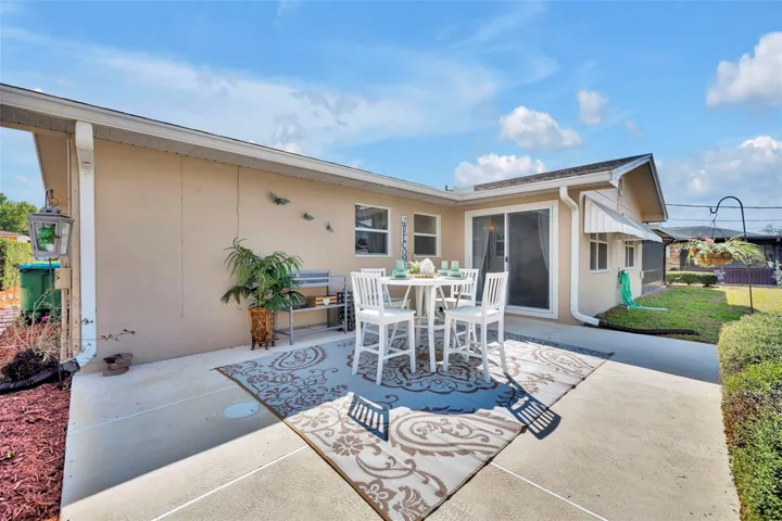Expansive 21.2 x 15 concrete patio for PLENTY OFCOOK OUTS AND BBQ's.