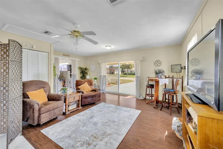 19.5 x 13.8 GREAT ROOM (Garage Conversion) Laminate flooring.   LARGE OPEN SPACIOUS and plenty of room!