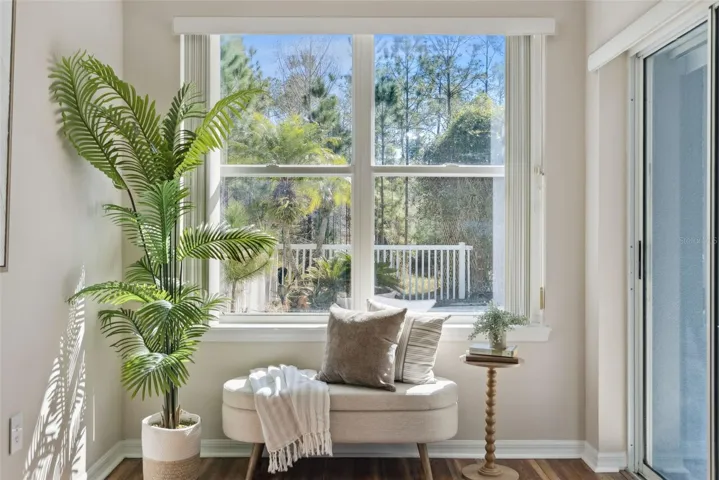 Primary Suite Sitting area overlooking backyard and pool