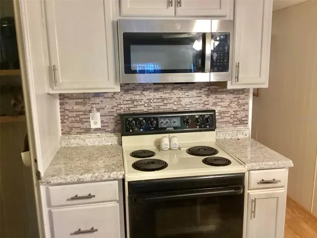 Stove with microwave