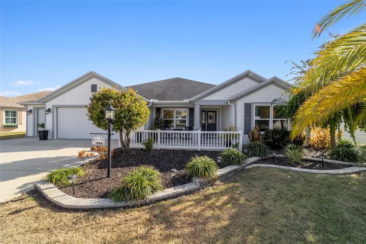 Enhanced landscaping compliments the exterior