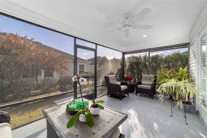 Privacy hedges and tropical landscaping create an oasis