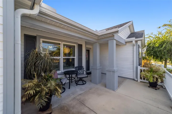 Spacious covered entry and front porch with room for seating
