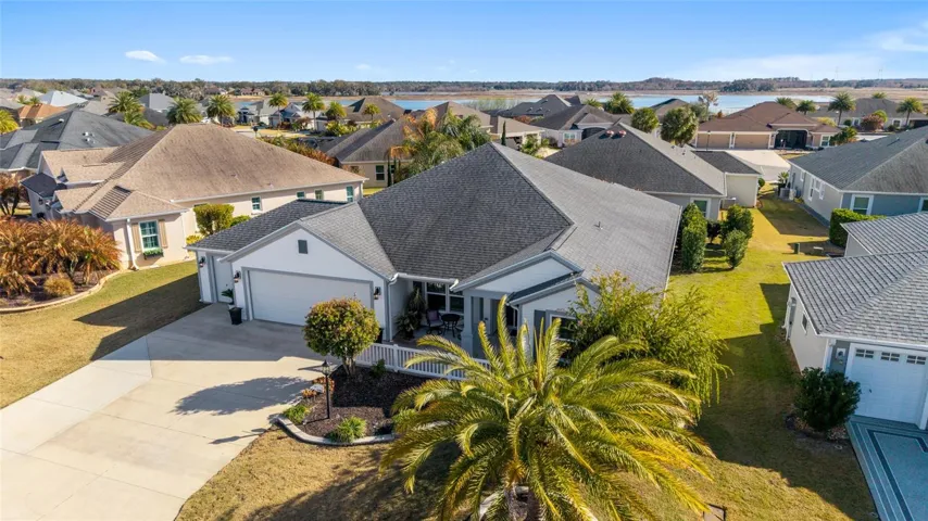 Two cars plus golf cart garage home, nestled in The Village of Pine Hills