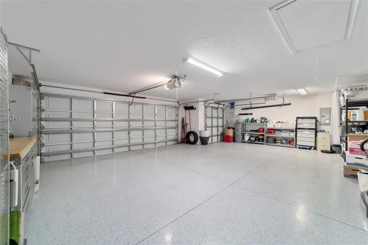 Two car plus golf cart garage with room for all of your Village toys!