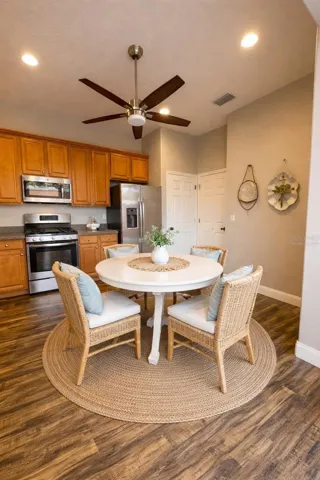 Virtually staged eat in kitchen area