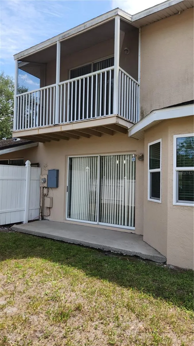 Rear yard with a patio
