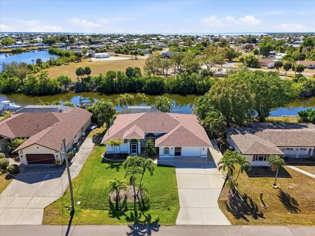Very nice curb appeal, expanded parking, and check the Park view across the canal.