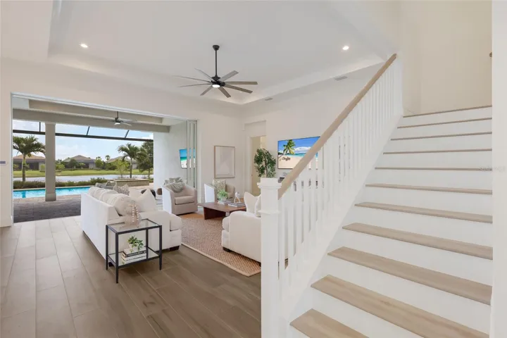 Stairs to bonus room and fourth guest bedroom and full bath