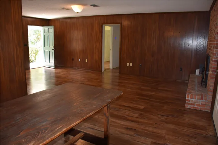 dining room. fireplace right, front door left