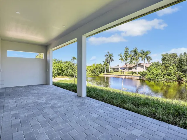 View of patio / terrace featuring a water view