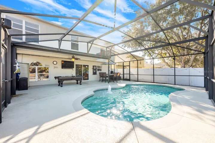 Private screened pool and no rear neighbors for the ultimate in indoor/outdoor living!