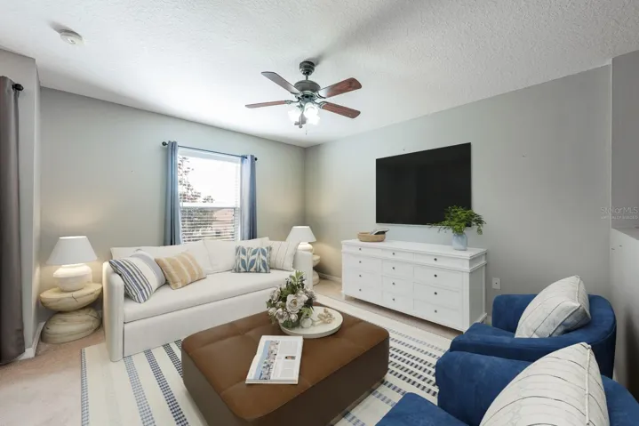 Second floor landing opens to a loft space. Virtually Staged.