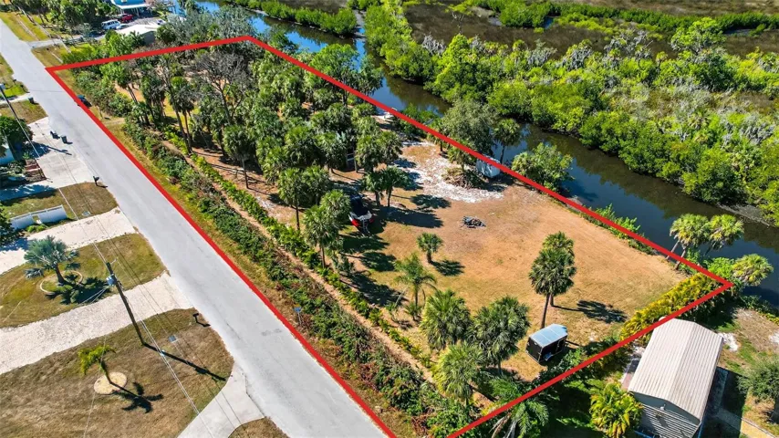 Aerial view of land with approximate property lines