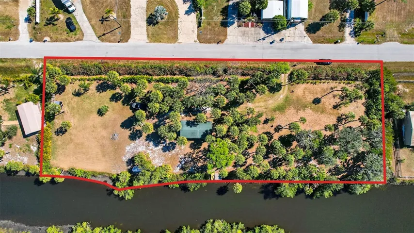 Aerial view of land with approximate property lines