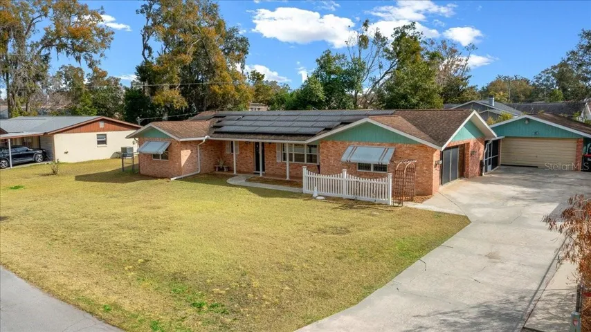 Brick exterior and large driveway