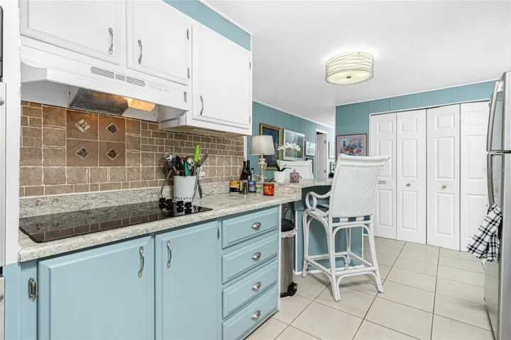 Look at those countertops with a Breakfast bar at the end