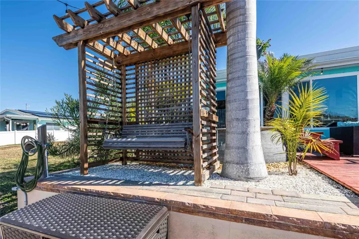 Pergola with swing.