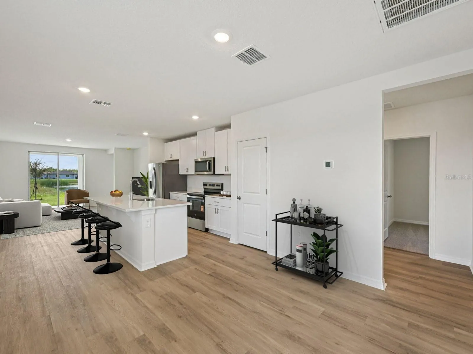 Interior photos are not of the actual home, but are photos of the builder home with the same floorplan with similar interior finishes and features. Photo uses virtual staging.