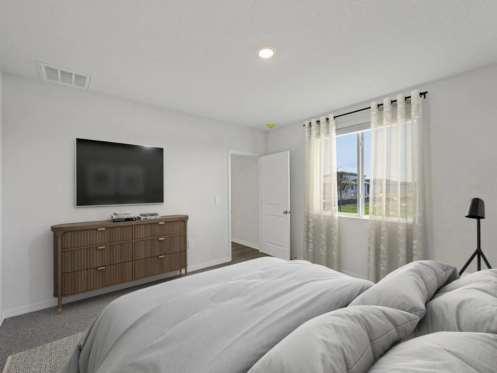 Interior photos are not of the actual home, but are photos of the builder home with the same floorplan with similar interior finishes and features. Photo uses virtual staging.