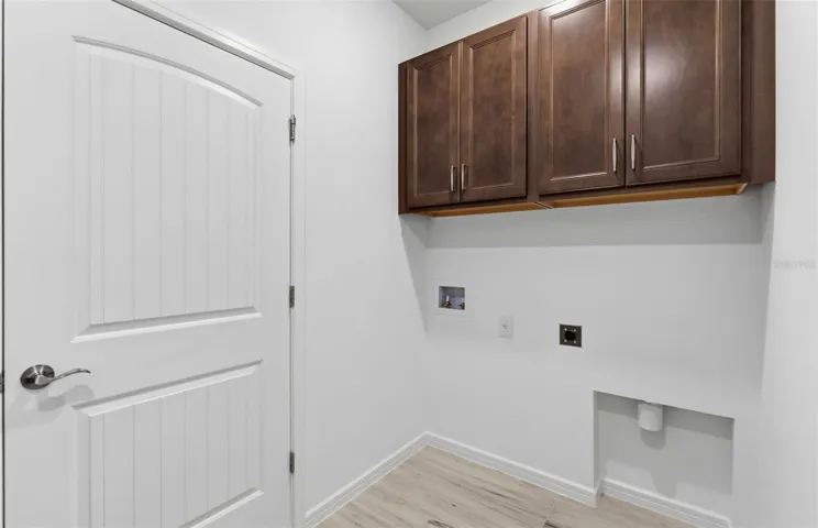Laundry Room w/Built-in Cabinets