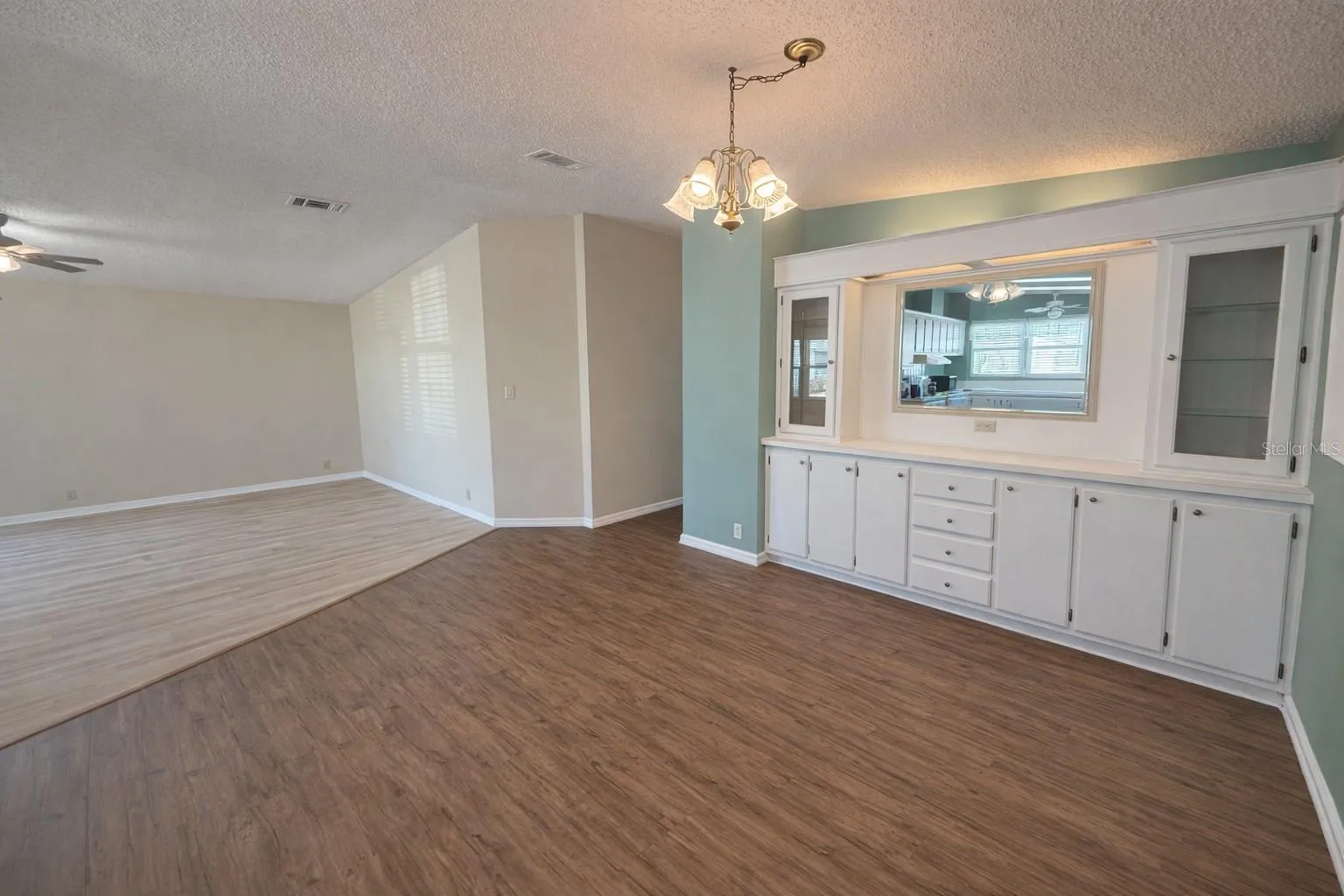 Dining room flows seamlessly into the living room