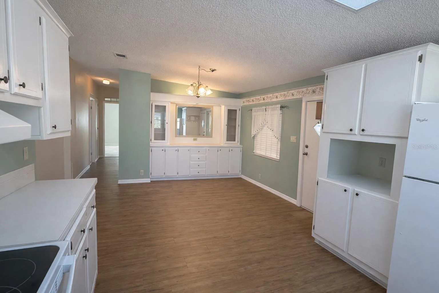 Kitchen and dining area with vinyl flooring
