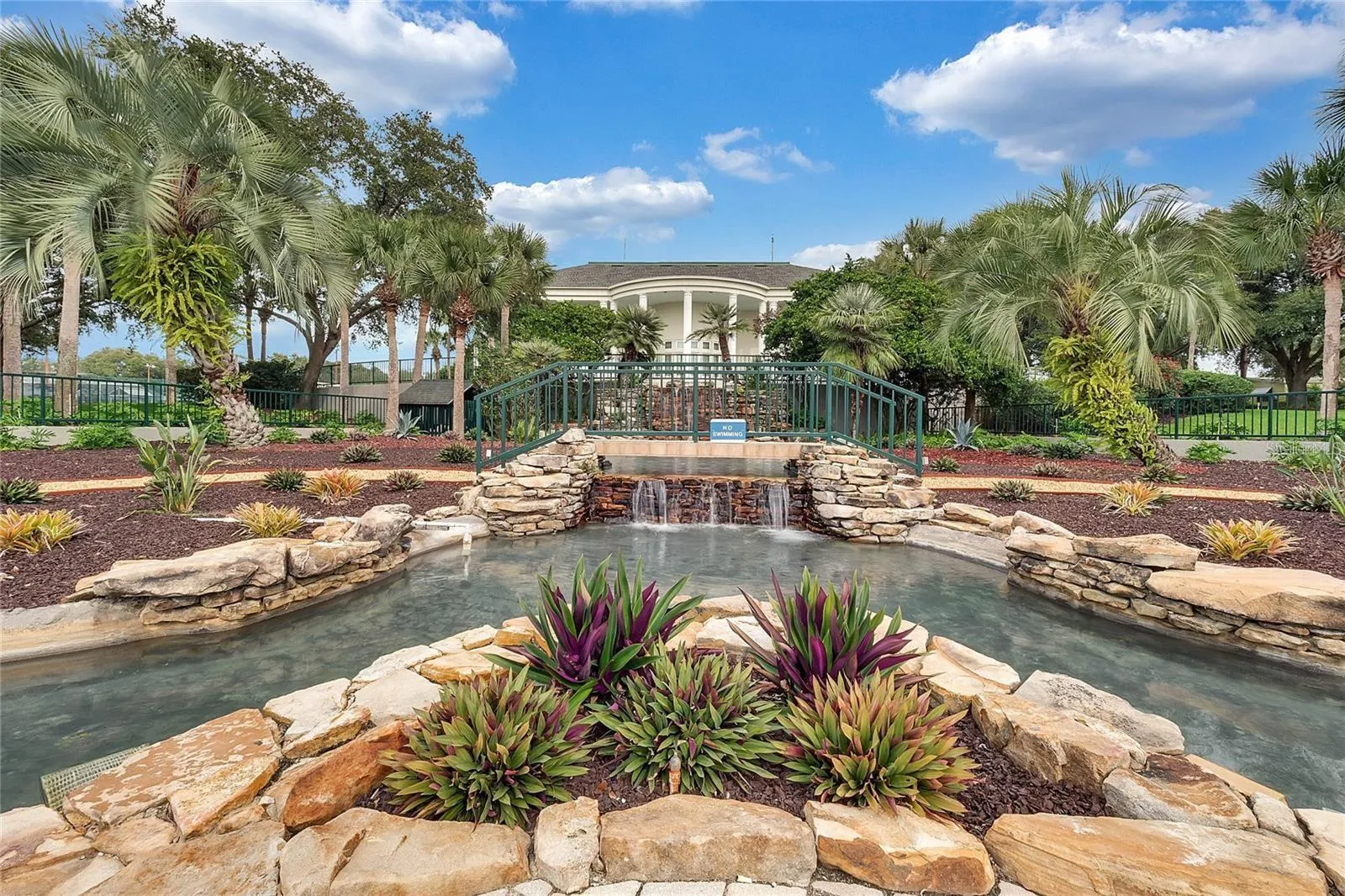Lovely walking paths and fountains abound in the community