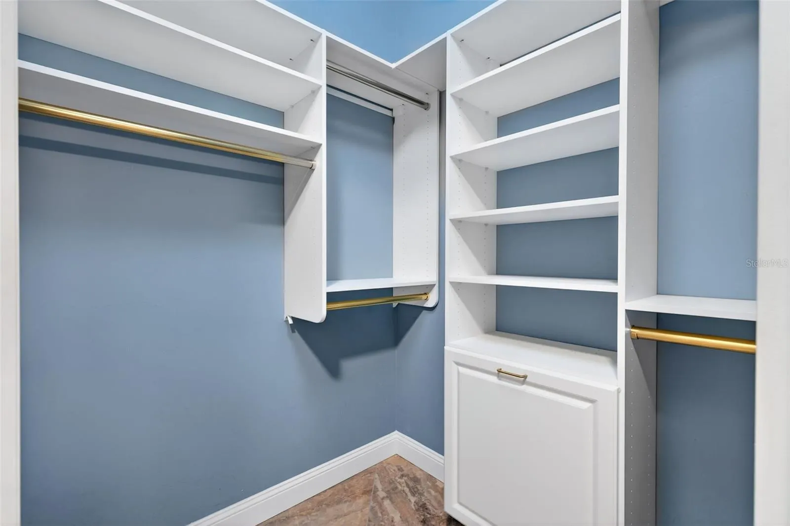 Primary/Master Walkin Closet with Custom built ins