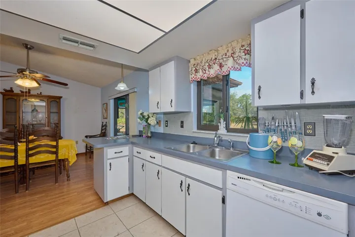 VIEW OF DINING ROOM FROM KITCHEN