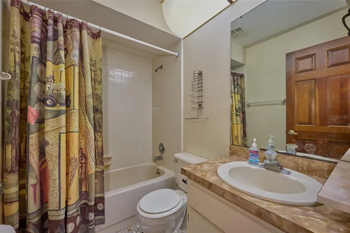 HALL FULL BATH WITH SHOWER AND BATHTUB